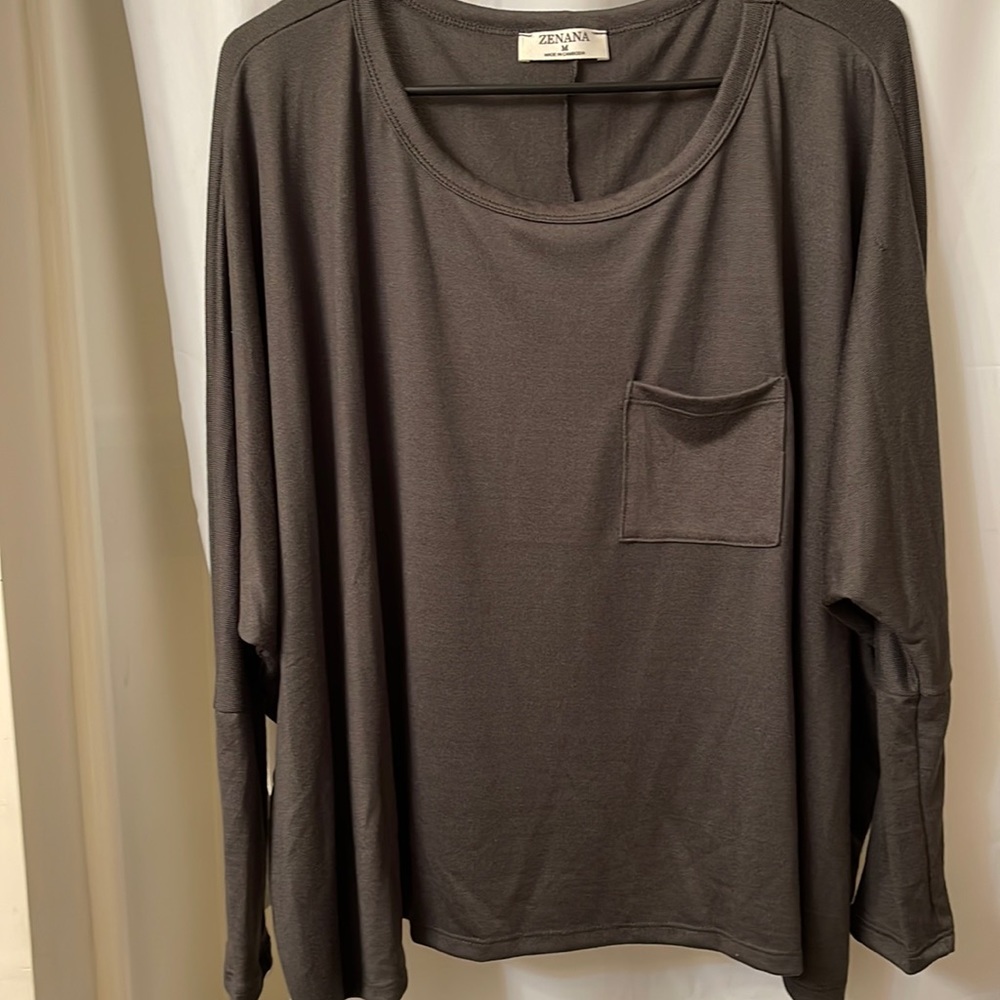 Women’s long sleeve knit top with bell sleeves